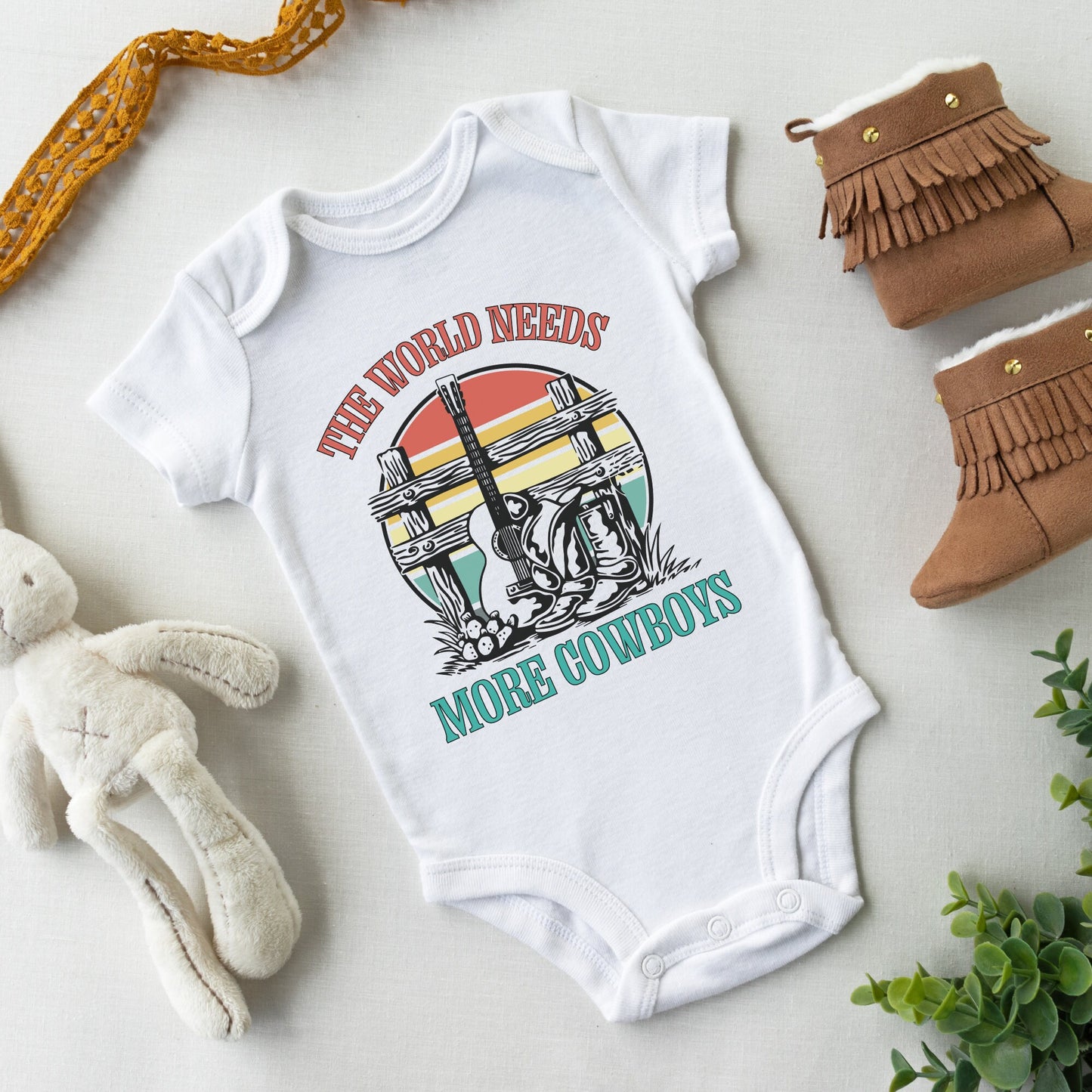 The world needs more cowboys Baby Onesie®, Cowboy baby Onesie®, Rodeo baby body suit. cute baby gift.